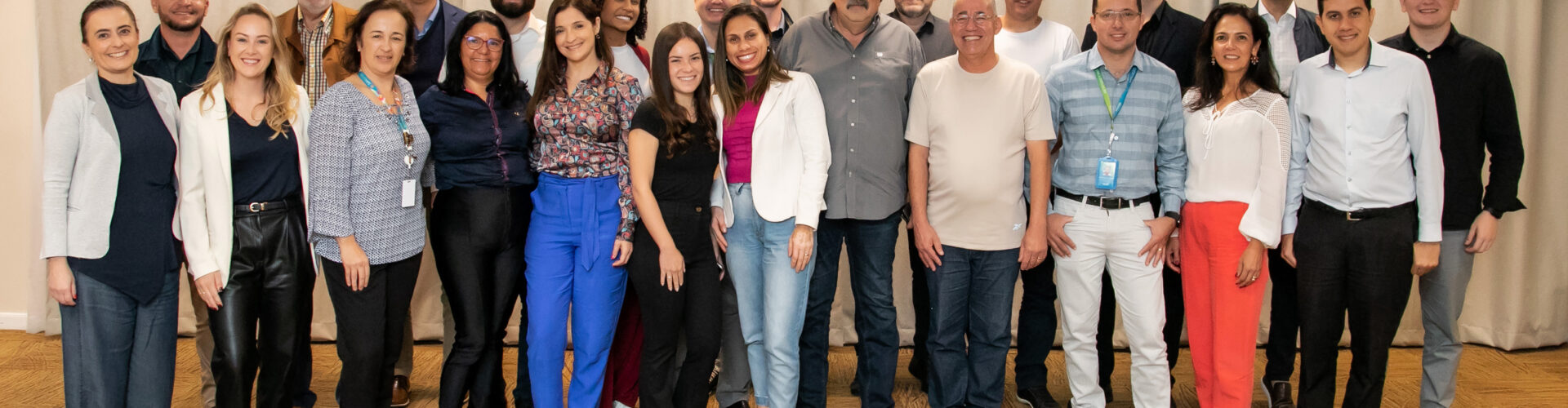 Photo with employees and partners together after the end of the Coffee with the Shareholders.