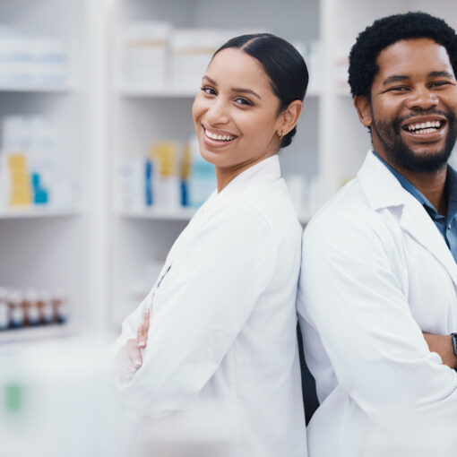 Pharmacists, teamwork and arms crossed in portrait, medicine trust or about us healthcare in medical drugstore collaboration. Smile, happy and confident pharmacy people in retail consulting or help